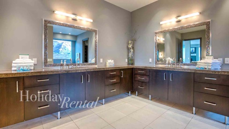 luxury vacation rental bathroom with his and her vantities